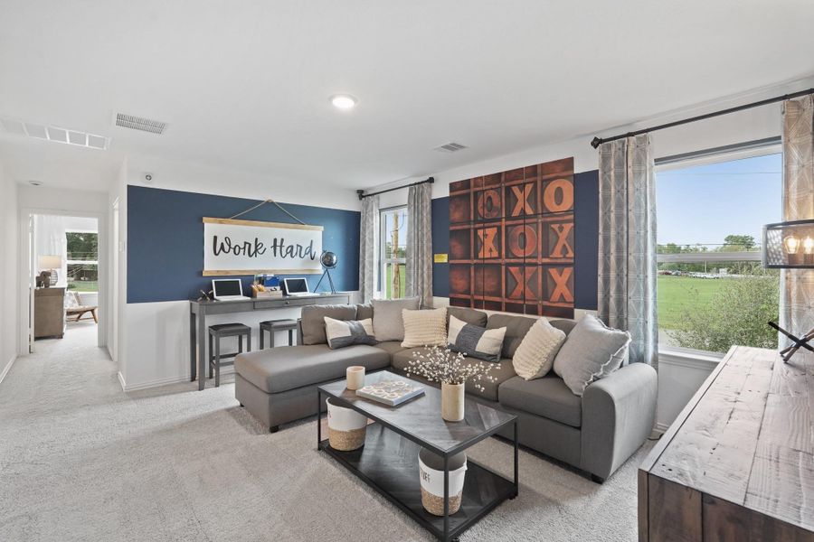 Whether you’re hosting friends for game night or enjoying a quiet evening with a good movie, this flex space seamlessly accommodates all your needs.