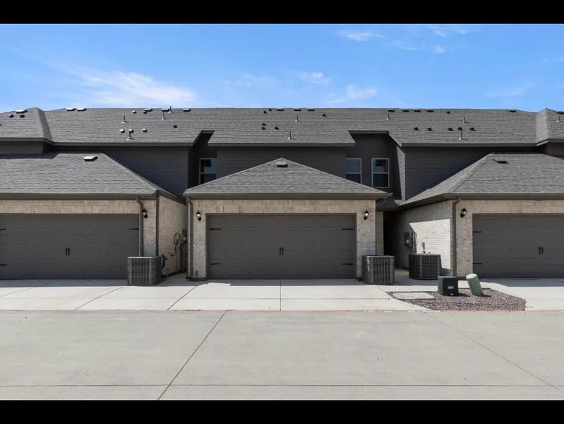 Front exterior of a new home in Sanger Circle, Sanger, TX, highlighting curb appeal (Image 28).