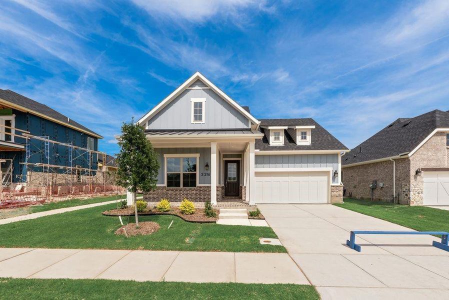 Front exterior of a new home in Bayside, Rowlett, TX, highlighting curb appeal (Image 23).
