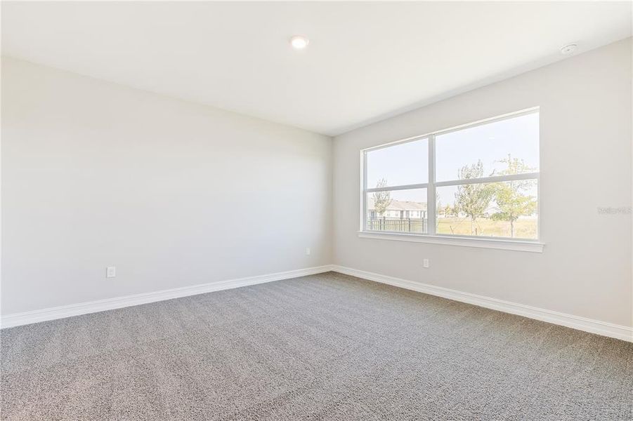 Spacious, unfurnished interior of a new home in Coral Lakes - Tradition & Express, Punta Gorda (Image 15).