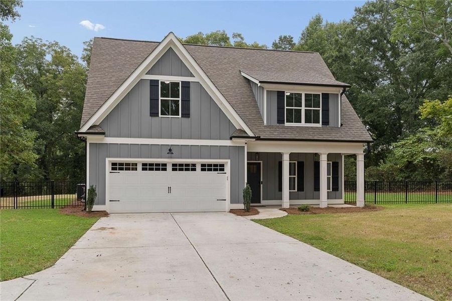 Front exterior of a new home in , Covington, GA, highlighting curb appeal (Image 25).