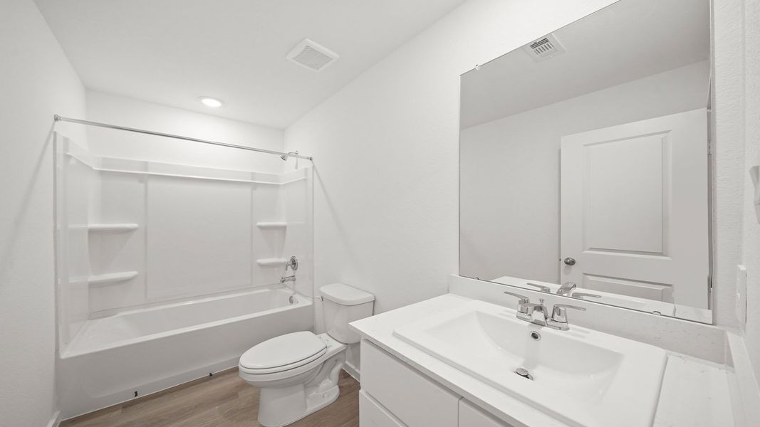 Representative furnished interior of a home built from the Dawson by D.R. Horton in Lexington Heights, Willis (Image 7).