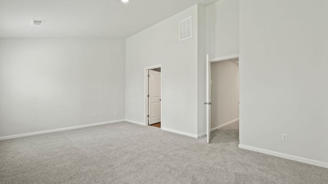 Spacious, unfurnished interior of a new home in Pine Hills Townhomes at Cane Bay, Summerville (Image 15).