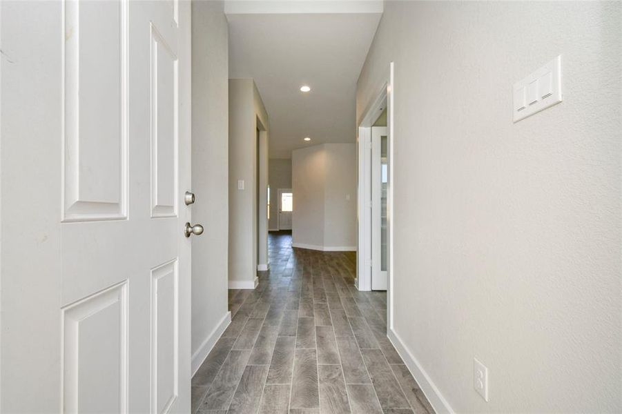 As you step into the threshold of this luxurious home, you&#39;ll soon be welcomed by anelegant glass door (to be installed). Inside, soaring ceilings amplify the spaciousness,while the refined wood-look tile flooring and oversized baseboards exudesophistication and charm.