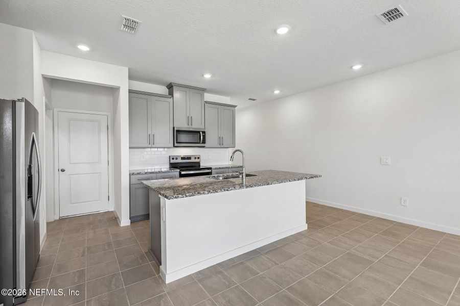 Furnished interior view inside a new home in Parkside at Shearwater, St. Augustine (Image 8).