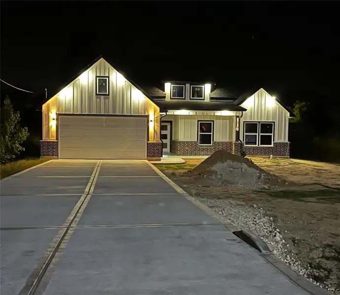 Front exterior of a new home in , Cleveland, TX, highlighting curb appeal (Image 2). Front exterior of a new home in , Cleveland, TX, highlighting curb appeal (Image 2).