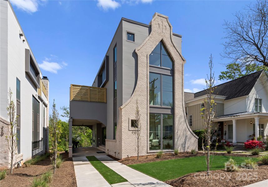Front exterior of a new home in , Charlotte, NC, highlighting curb appeal (Image 1).