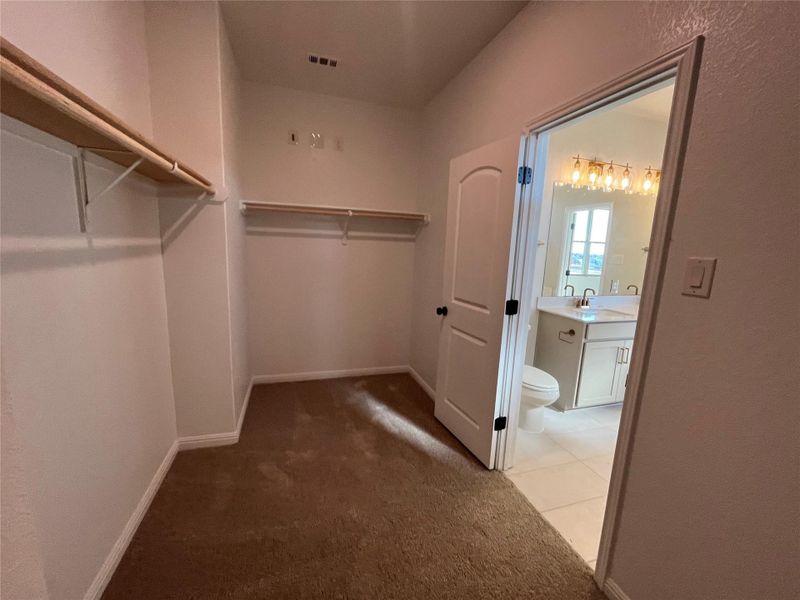 Spacious, unfurnished interior of a new home in The Cottages at Lariat, Liberty Hill (Image 17).