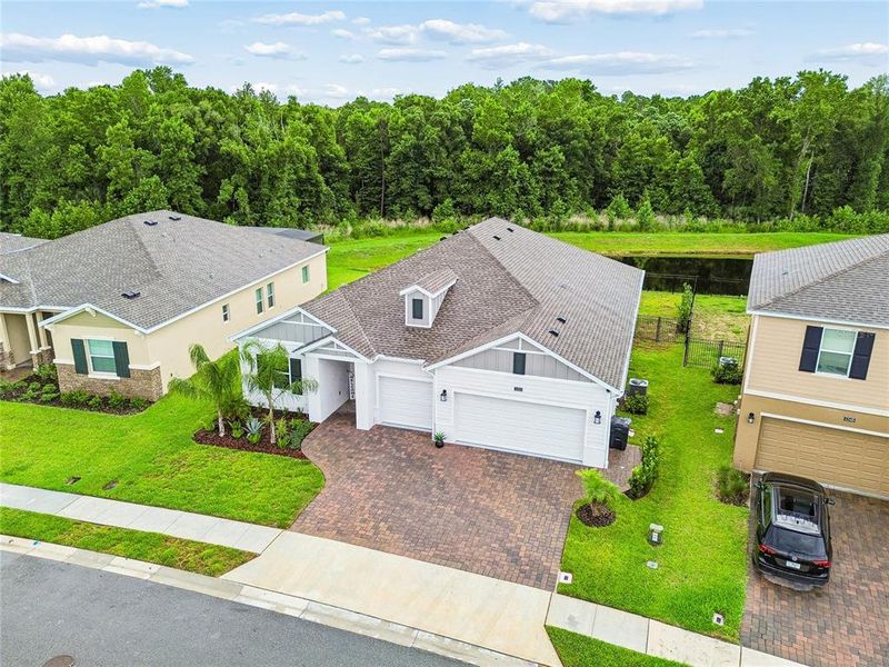 Front exterior of a new home in Providence, Davenport, FL, highlighting curb appeal (Image 29).