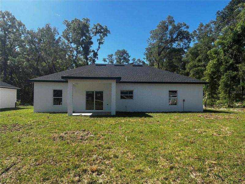 Exterior details and patio area of a home in , Summerfield (Image 3). Exterior details and patio area of a home in , Summerfield (Image 3).