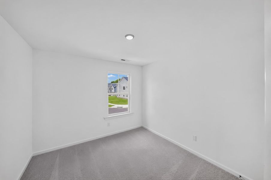 Spacious, unfurnished interior of a new home in Magnolia Townes, Wendell (Image 17).