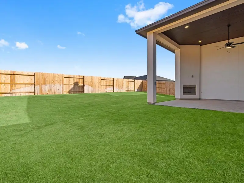 Front exterior of a new home in Audubon 60’s, Magnolia, TX, highlighting curb appeal (Image 2). Front exterior of a new home in Audubon 60’s, Magnolia, TX, highlighting curb appeal (Image 2).