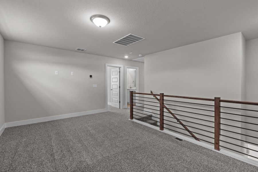 Representative unfurnished interior of a home built from the Majestic View II by View Homes in Skybrooke, Live Oak (Image 23).