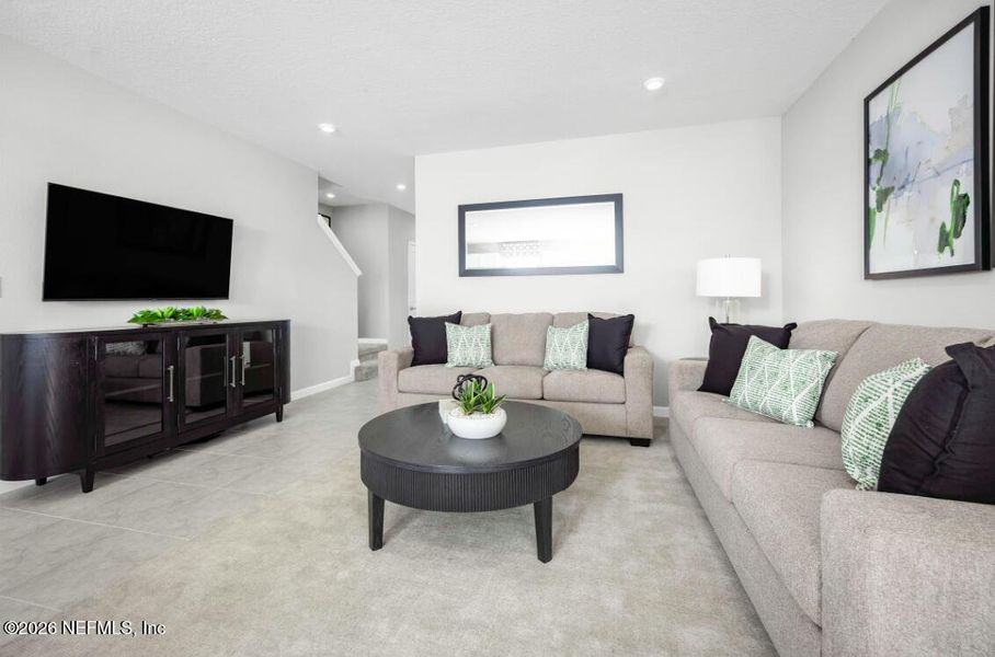 Furnished interior view inside a new home in Seminole Palms Townhomes, Palm Coast (Image 4).