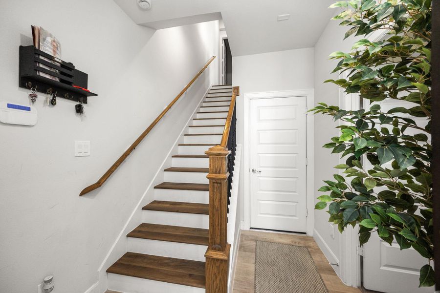 Spacious, unfurnished interior of a new home in The Corner At Buffalo Pointe, Houston (Image 23).