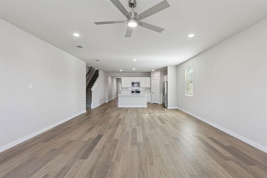 Open First Floor in the Holden home plan by Trophy Signature Homes – REPRESENTATIVE PHOTO