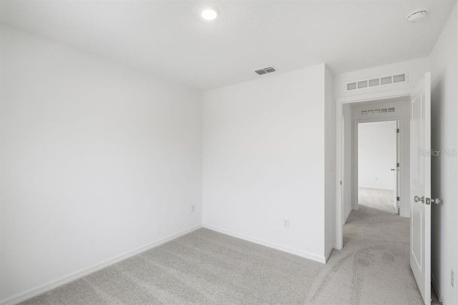 Spacious, unfurnished interior of a new home in Waterstone, Groveland (Image 37).