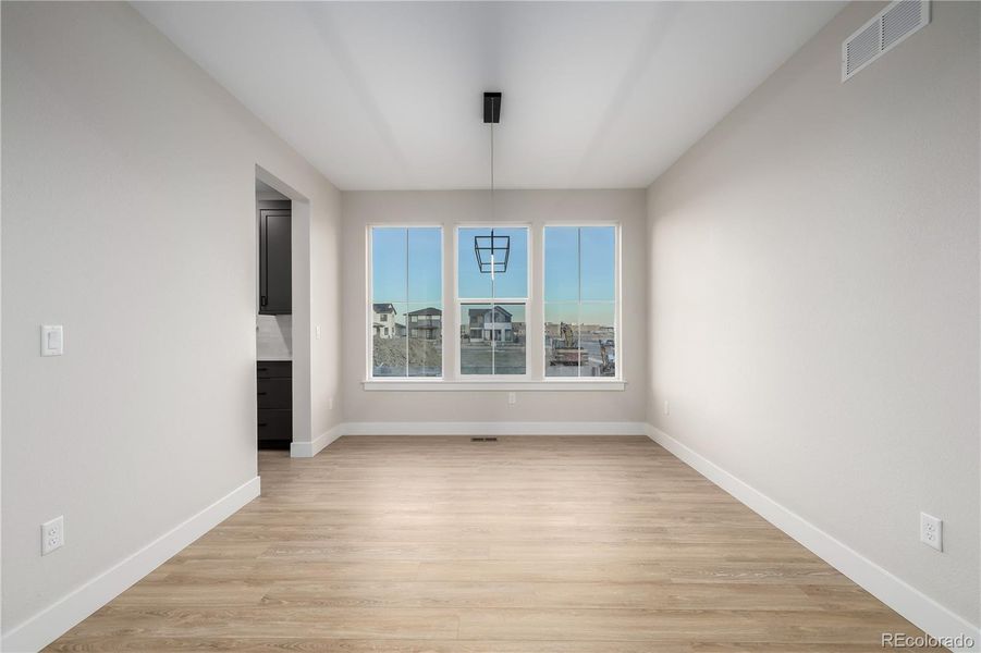 Spacious, unfurnished interior of a new home in West Grange, Longmont (Image 43).
