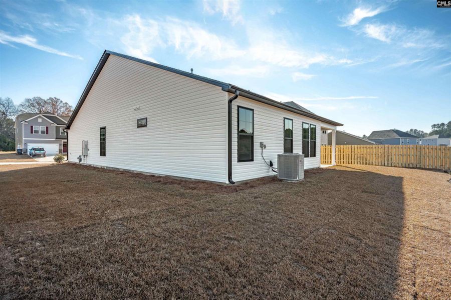 Exterior details and patio area of a home in Old Charleston Acres, Pelion (Image 22).