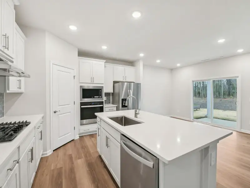 Furnished interior view inside a new home in Country Lane - Signature Series, Clayton (Image 5).