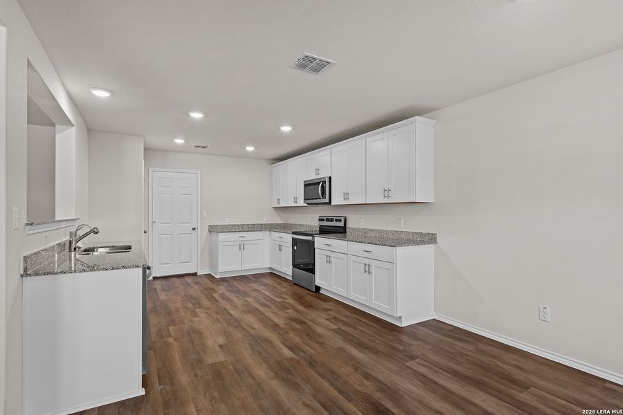Furnished interior view inside a new home in , New Braunfels (Image 12).