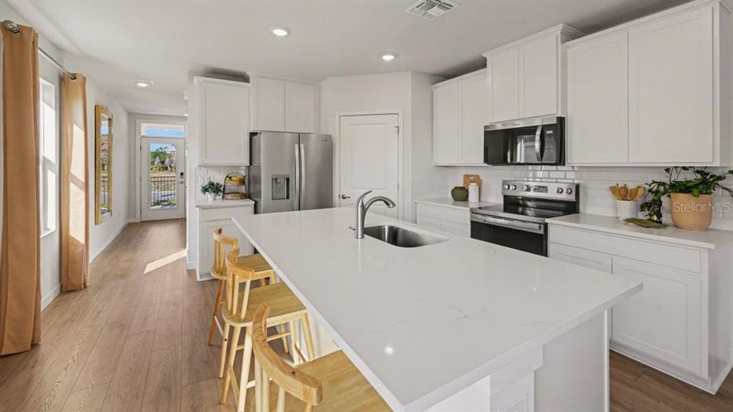 Furnished interior view inside a new home in Driftwood Bay, Port Charlotte (Image 12).