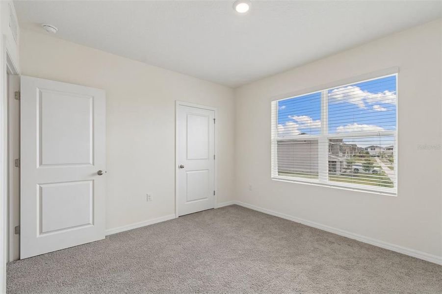 Spacious, unfurnished interior of a new home in Epperson, Wesley Chapel (Image 26).