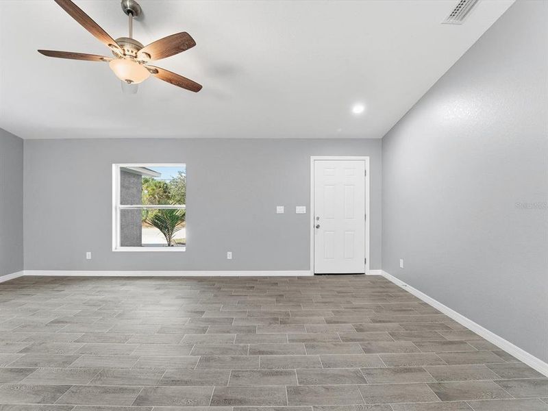 Spacious, unfurnished interior of a new home in , Port Charlotte (Image 18).