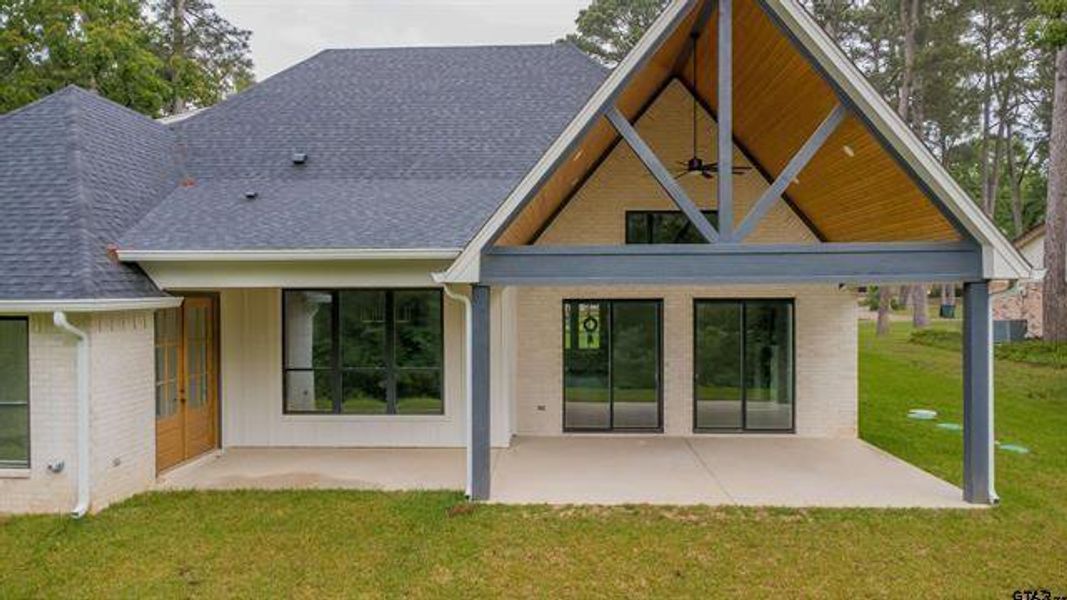 Exterior details and patio area of a home in , Hideaway (Image 3).