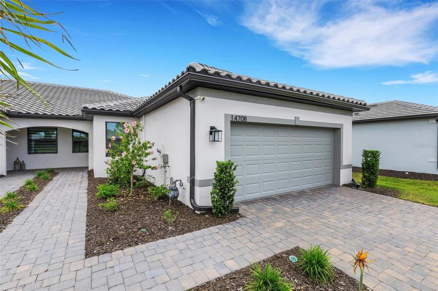 Front exterior of a new home in , Nokomis, FL, highlighting curb appeal (Image 25).