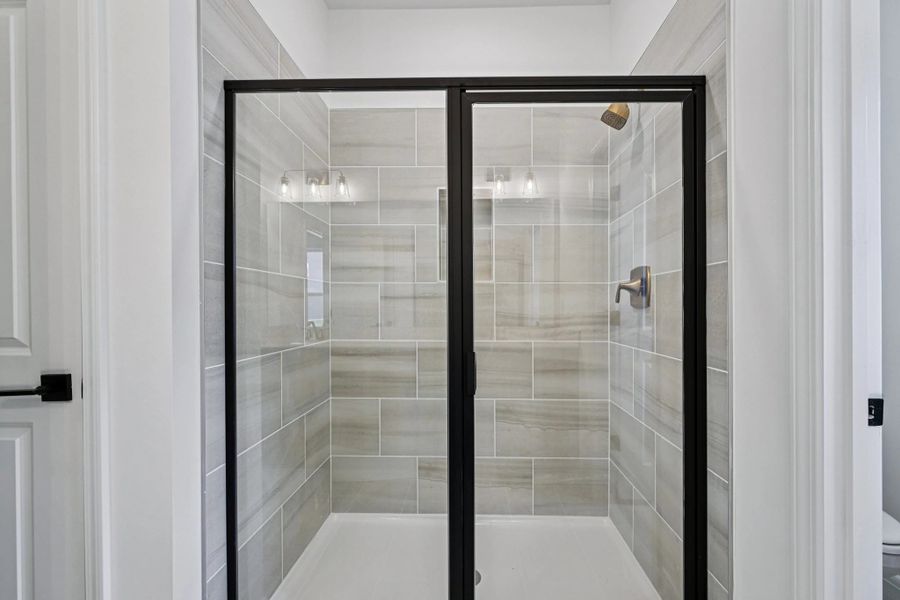 Primary Bath featuring the AW Collection® Sapphire - Clean white and cool hues define the space. Primary Bath featuring the AW Collection® Sapphire - Clean white and cool hues define the space.