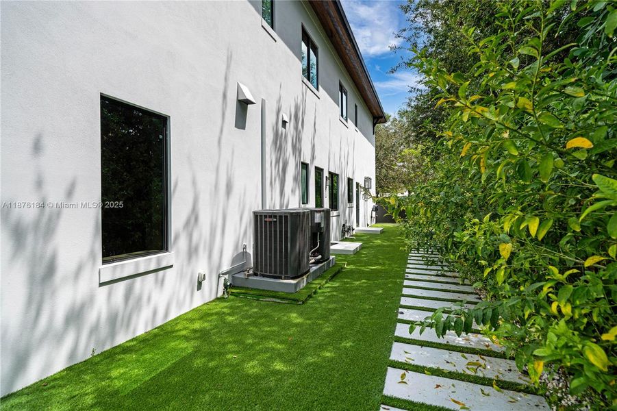 Front exterior of a new home in , Pinecrest, FL, highlighting curb appeal (Image 21). Front exterior of a new home in , Pinecrest, FL, highlighting curb appeal (Image 21).