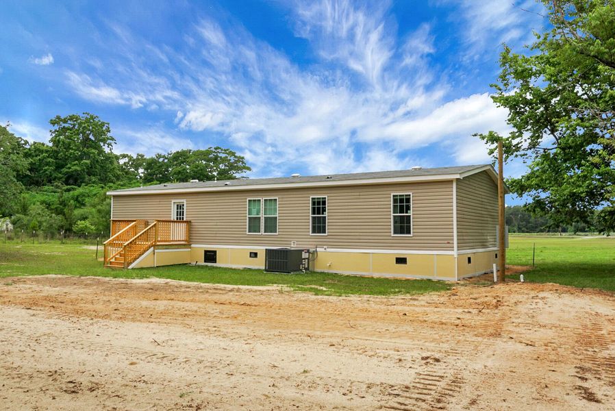 Exterior details and patio area of a home in , Eutawville (Image 26).