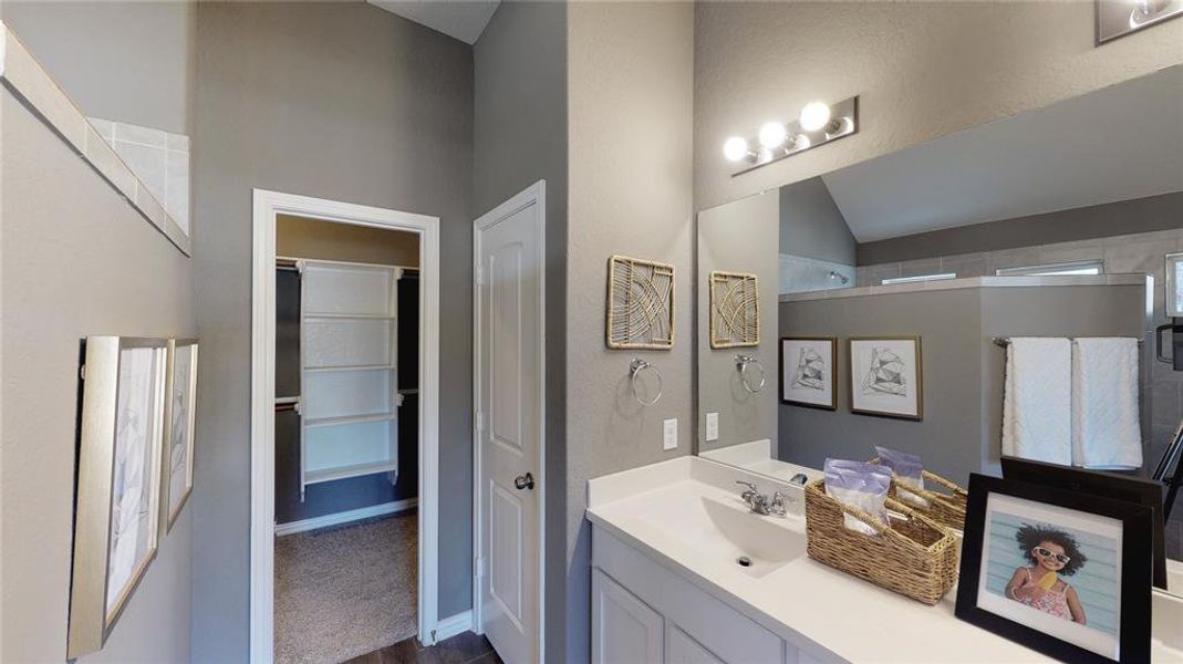 Full bath with vanity and a shower Full bath with vanity and a shower