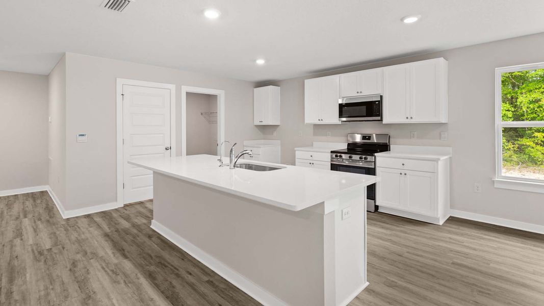 Furnished interior view inside a new home in Sunny Hills, Chipley (Image 6).