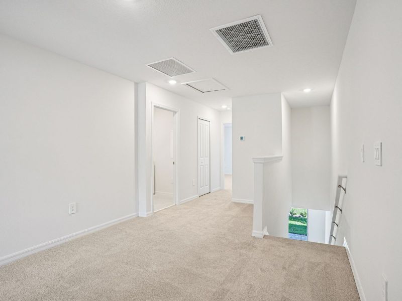 Spacious, unfurnished interior of a new home in The Meadow at Crossprairie Townes, St. Cloud (Image 10).