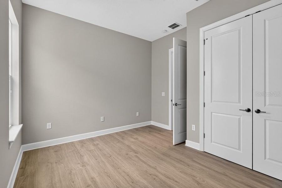 Spacious, unfurnished interior of a new home in Center Lake Ranch Community Group Page, St. Cloud (Image 17).