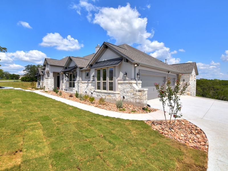 Representative exterior photo of a completed home built from the Coronado I by Giddens Homes in Clearwater Ranch, Liberty Hill, TX (Image 32).