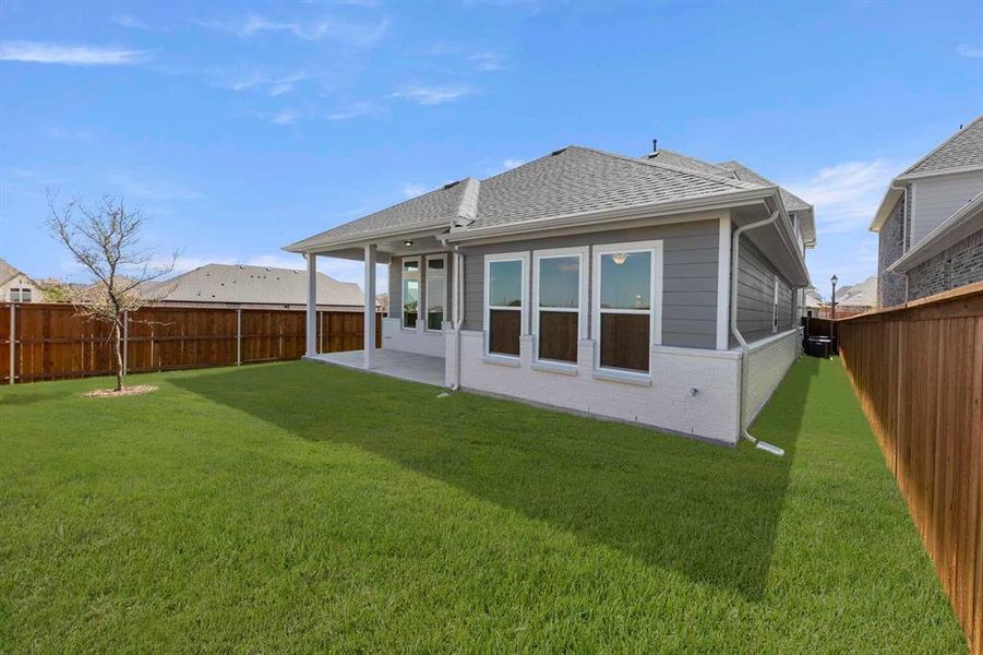 Exterior details and patio area of a home in Inspiration, Lucas (Image 3). Exterior details and patio area of a home in Inspiration, Lucas (Image 3).