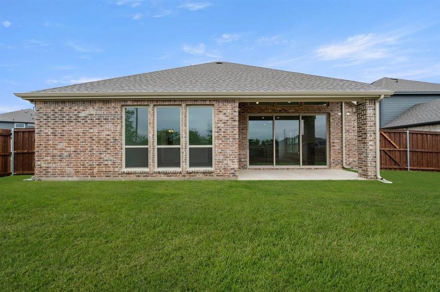 Front exterior of a new home in Westside Preserve, Midlothian, TX, highlighting curb appeal (Image 28).