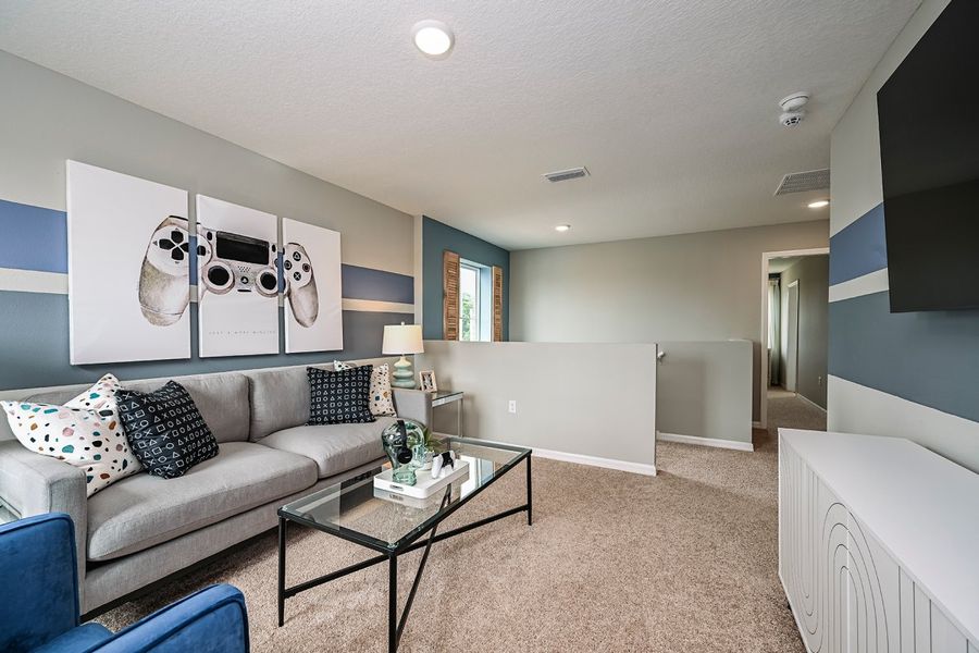 Furnished interior view inside a new home in Scenic Terrace, Haines City (Image 13).