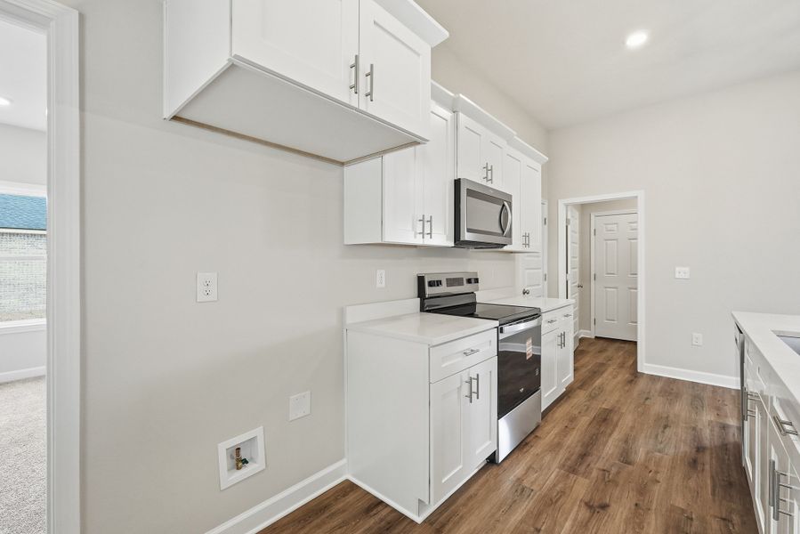 Furnished interior view inside a new home in Southern Charm, Crestview (Image 9).