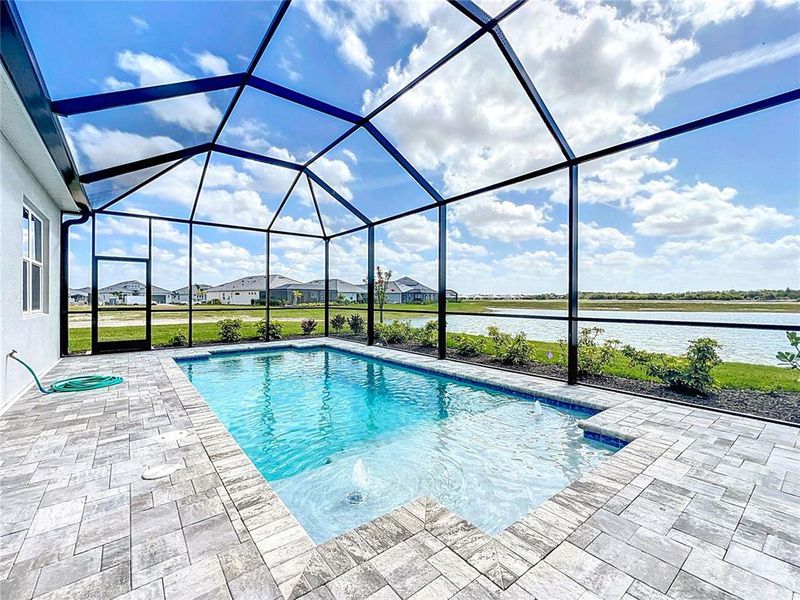 Exterior details and patio area of a home in Watercolor Place, Bradenton (Image 34).