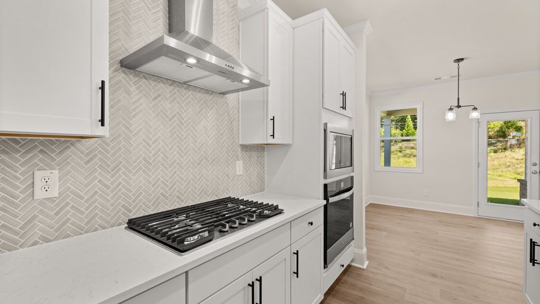 Representative furnished interior of a home built from the WINDSOR by D.R. Horton in Butner Estates, South Fulton (Image 12).