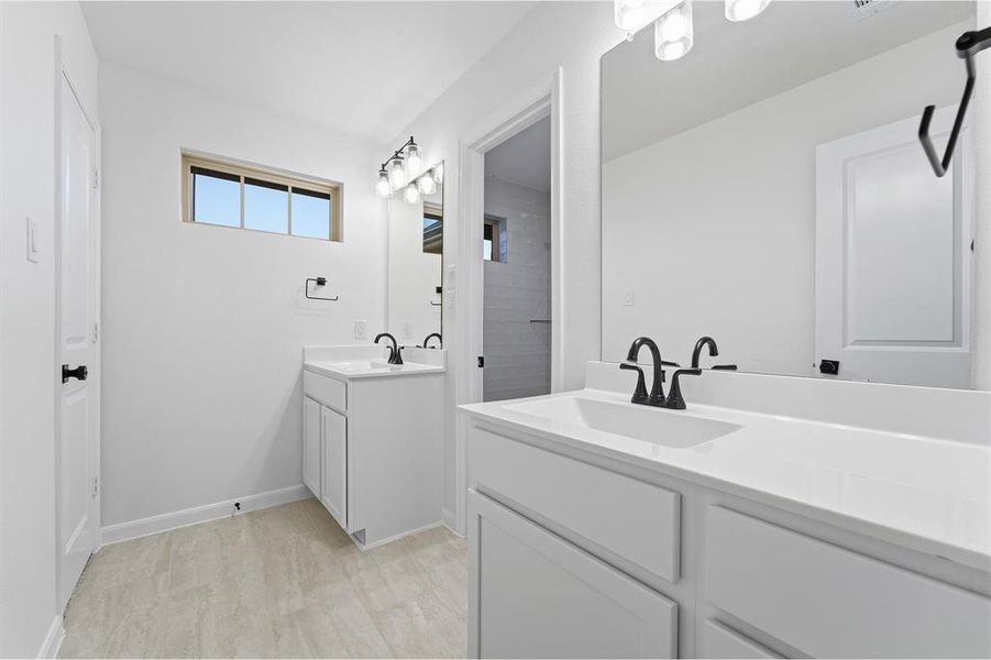 Furnished interior view inside a new home in Green Meadows, Celina (Image 6).