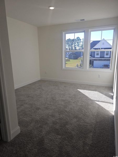 Spacious, unfurnished interior of a new home in Avery Woods, Longs (Image 24).