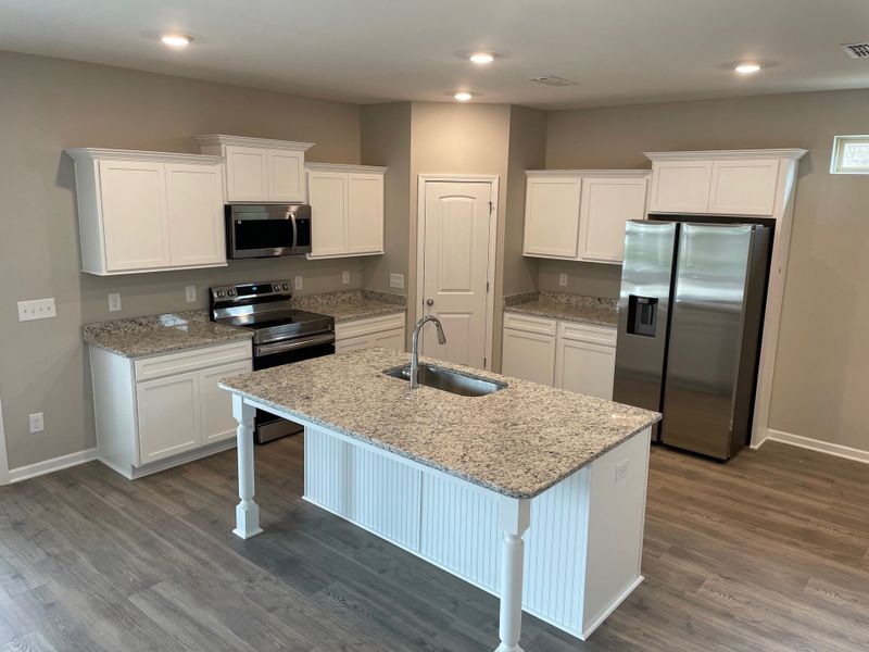 Furnished interior view inside a new home in Brandon Woods, Spring Hill (Image 5).