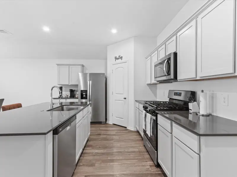 Furnished interior view inside a new home in , Magnolia (Image 12).