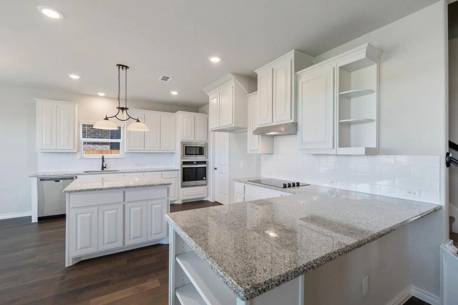 Kitchen | Concept 2393 at Lovers Landing in Forney, TX by Landsea Homes