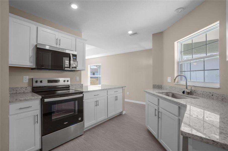Furnished interior view inside a new home in , Floral City (Image 7).